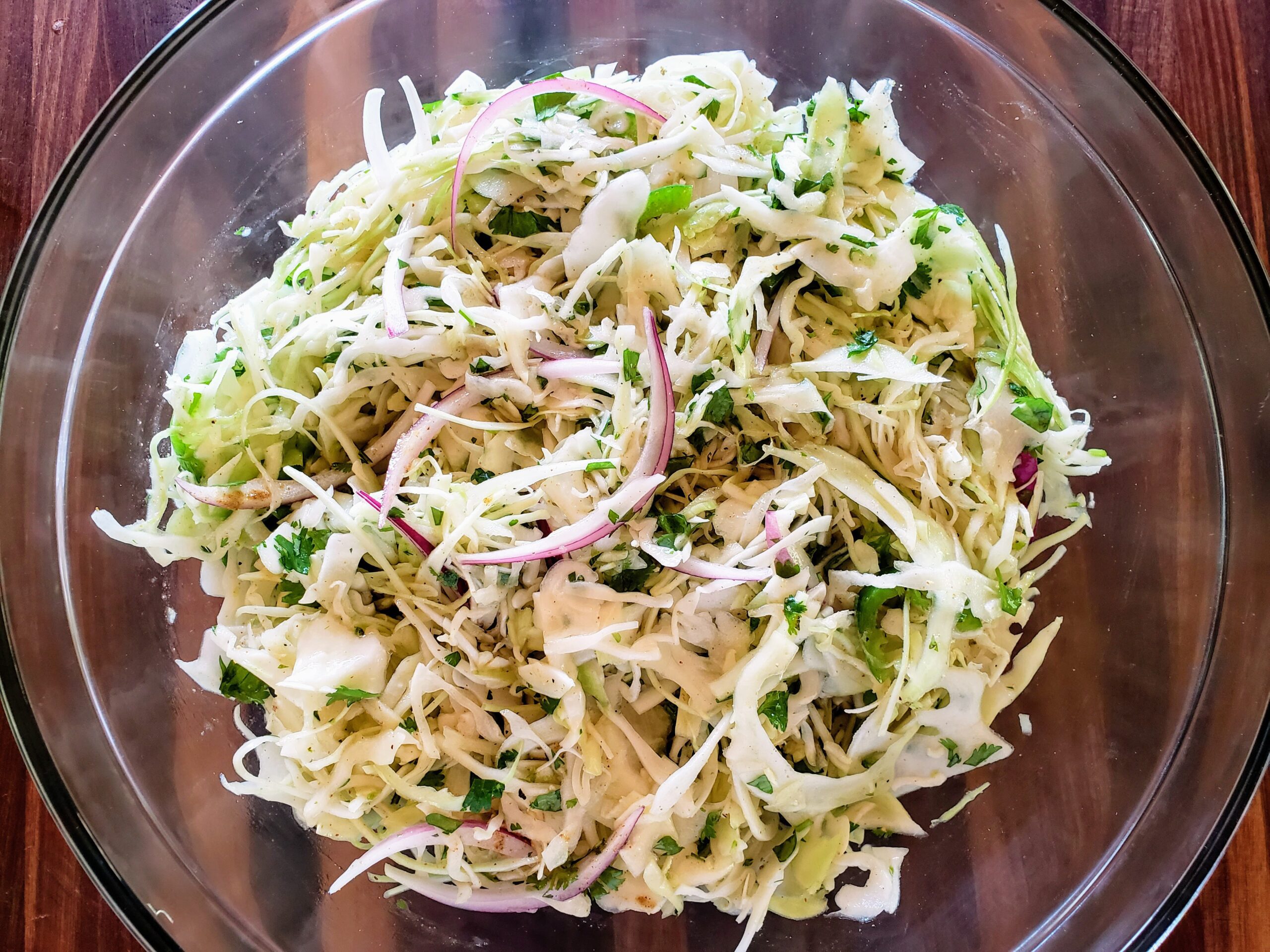 https://cuisinewithme.com/wp-content/uploads/2021/09/Cilantro-lime-cabbage-slaw-2-scaled.jpg